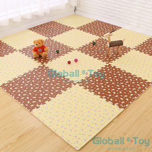 &ccedil;i&ccedil;ek desenli yumuşak oyun matı kahverengi ve sarı birbirine ge&ccedil;meli fayanslar